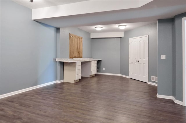 interior space with dark wood-type flooring