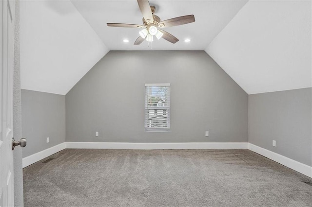 bonus room with carpet flooring, ceiling fan, and lofted ceiling