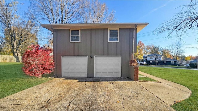 garage with a yard