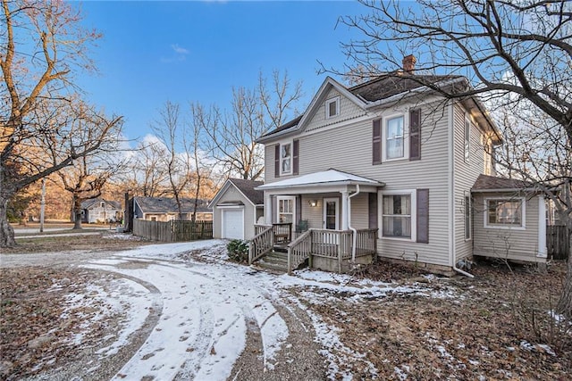 front of property featuring a porch and a garage