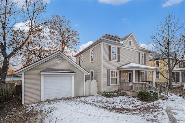 front facade with a porch and a garage