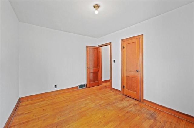 empty room featuring light hardwood / wood-style flooring