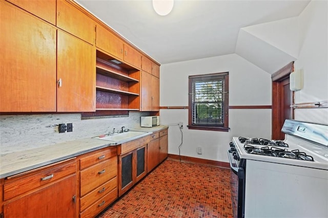 kitchen with white appliances, a sink, baseboards, open shelves, and tasteful backsplash