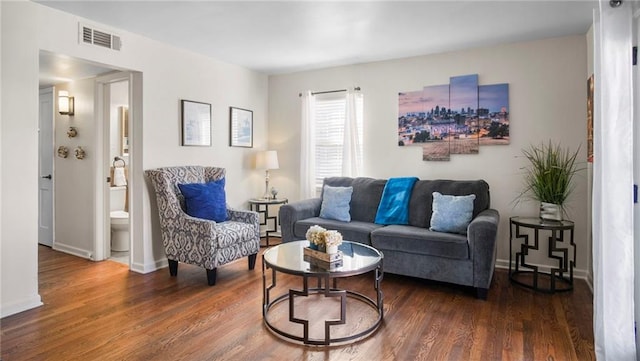 living room featuring dark hardwood / wood-style flooring