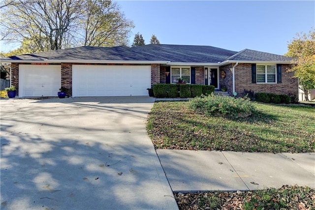 ranch-style home featuring a garage