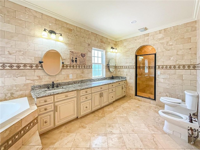 full bathroom with shower with separate bathtub, a bidet, tile walls, and ornamental molding