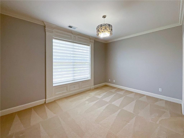 carpeted empty room with crown molding