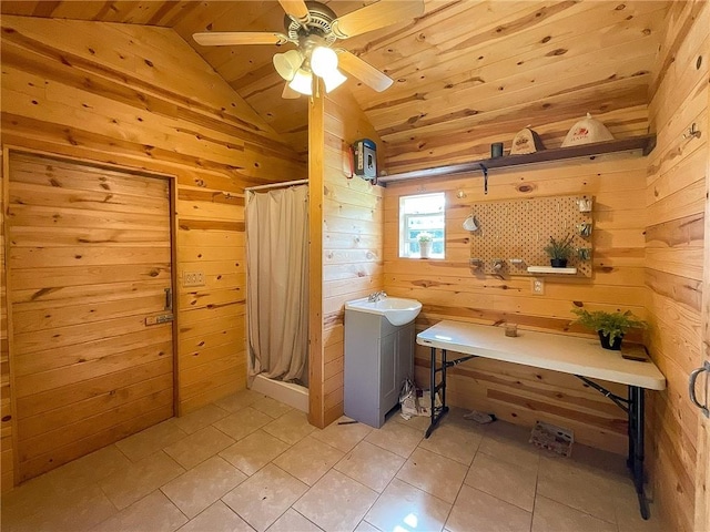 bathroom with tile patterned flooring, wood ceiling, lofted ceiling, and wood walls