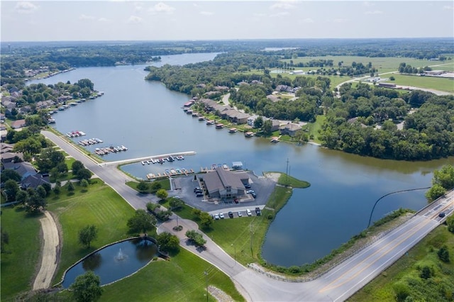 birds eye view of property featuring a water view