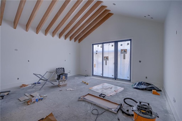 16 Checotah Bluffs Cir, Lake Winnebago, MO 64034 - unfurnished living room with lofted ceiling