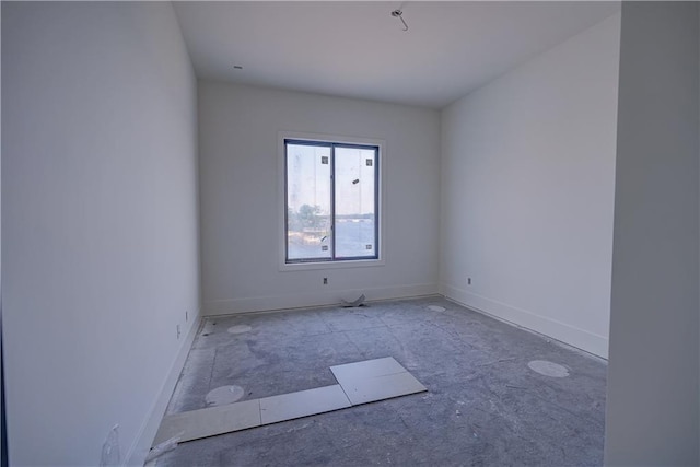 16 Checotah Bluffs Cir, Lake Winnebago, MO 64034 - spare room with baseboards