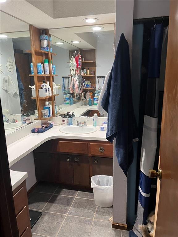 bathroom featuring vanity and tile patterned floors