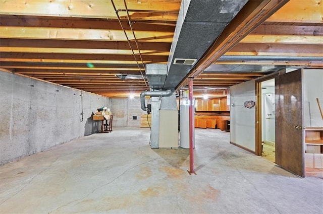 basement with heating unit