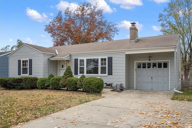 single story home featuring a front yard and a garage