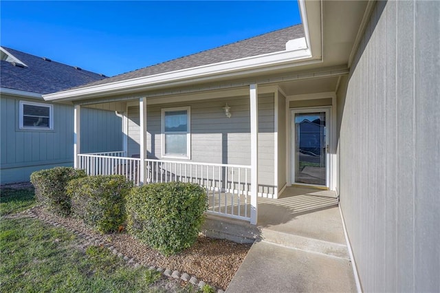 entrance to property featuring a porch