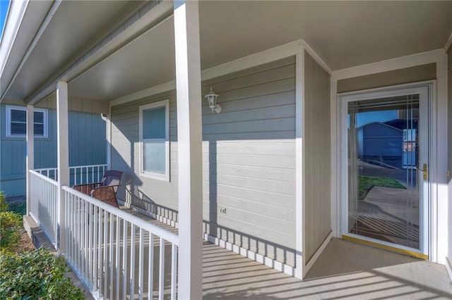 property entrance with a porch