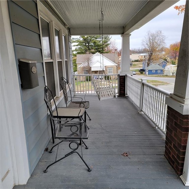 wooden deck featuring a porch