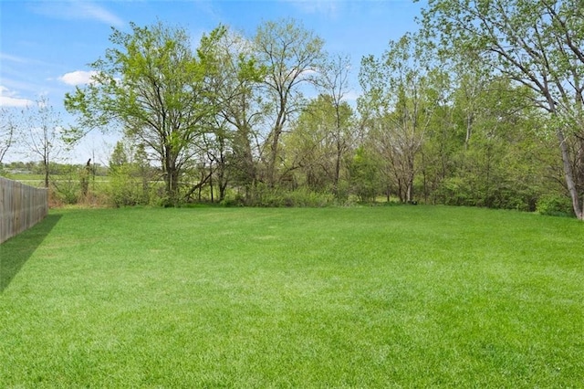 view of yard featuring fence