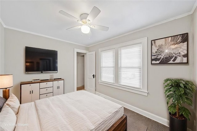 bedroom featuring carpet flooring, ceiling fan, and crown molding