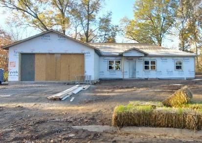 property in mid-construction featuring a garage