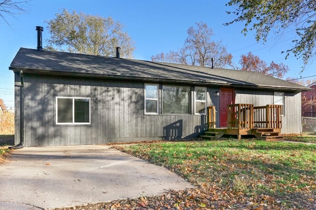 view of front of home featuring a wooden deck