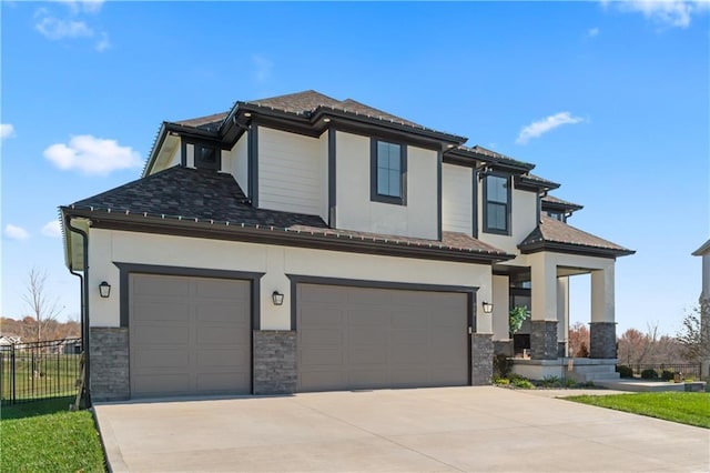 view of front of property with a garage