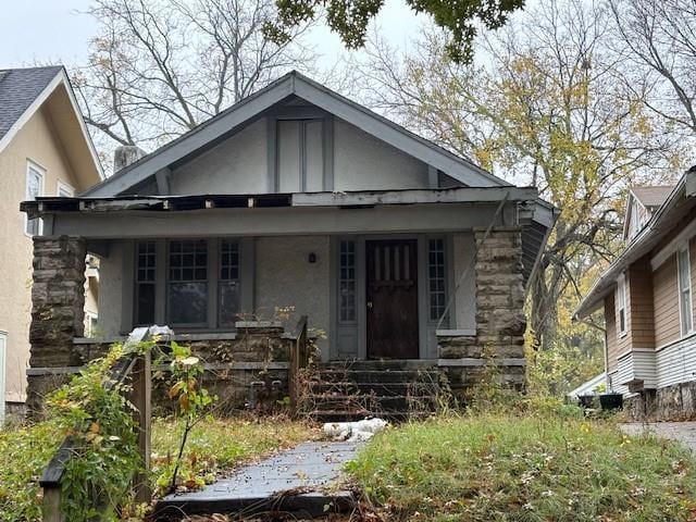 bungalow-style house with a porch