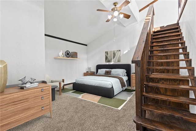 bedroom with carpet flooring, ceiling fan, and lofted ceiling