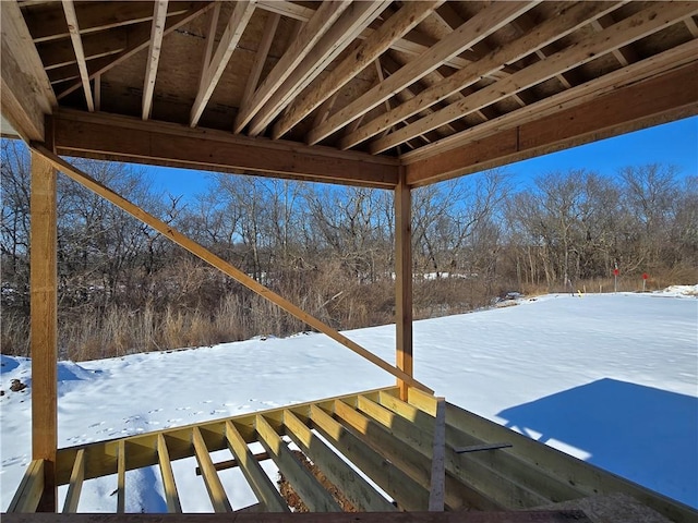 view of snow covered deck