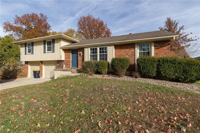 tri-level home featuring a front lawn and a garage