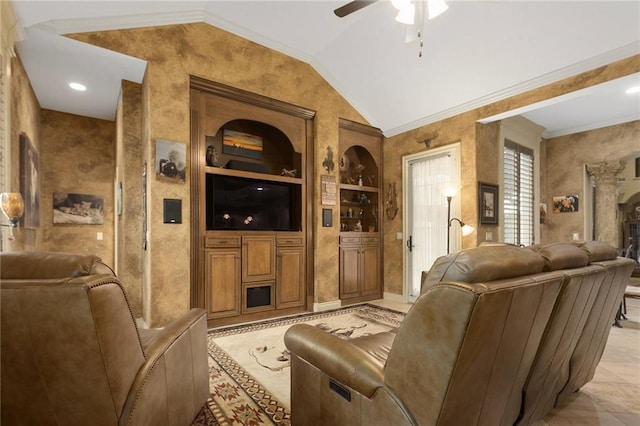 living room with built in shelves, ceiling fan, crown molding, and vaulted ceiling