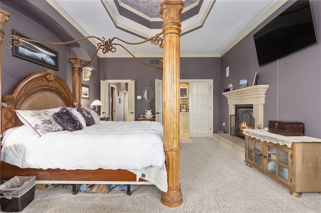 carpeted bedroom featuring a towering ceiling and ornamental molding