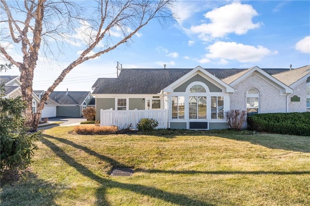 view of front of home featuring a front yard