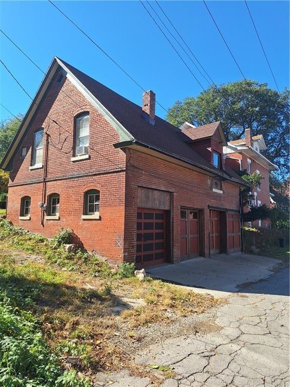 view of home's exterior with a garage