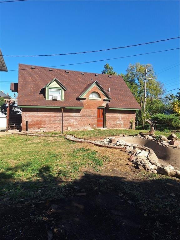 exterior space with a front yard