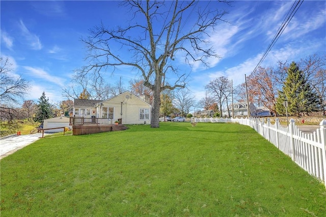 view of yard featuring a wooden deck