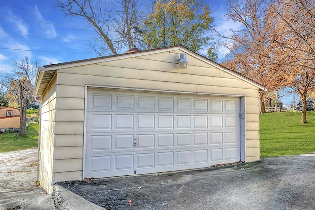 garage with a lawn