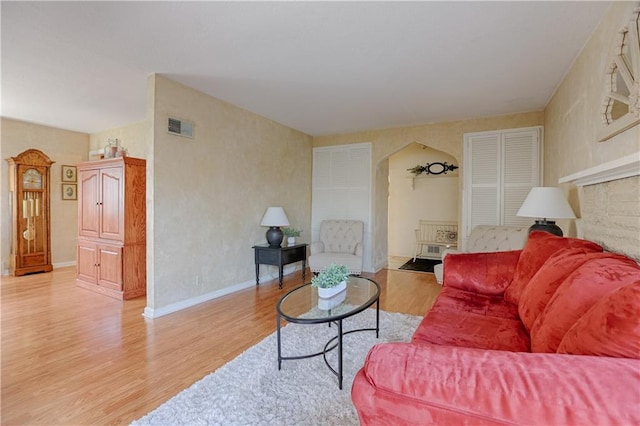 living room with hardwood / wood-style flooring