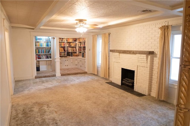 unfurnished living room featuring light colored carpet, a brick fireplace, and ornamental molding