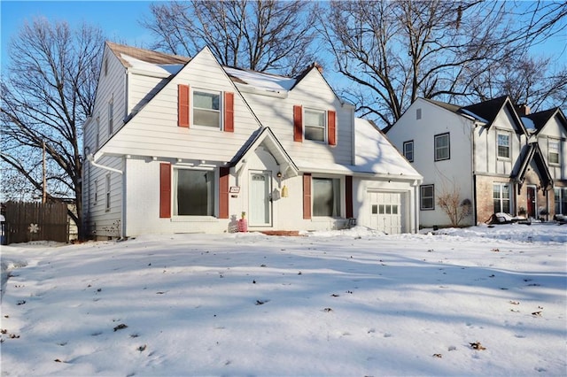 view of front of property with a garage