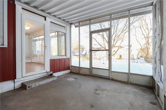 unfurnished sunroom featuring a healthy amount of sunlight