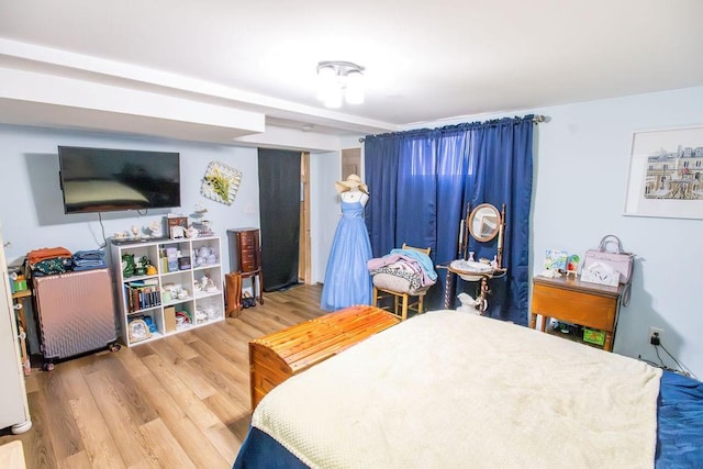 bedroom featuring wood-type flooring