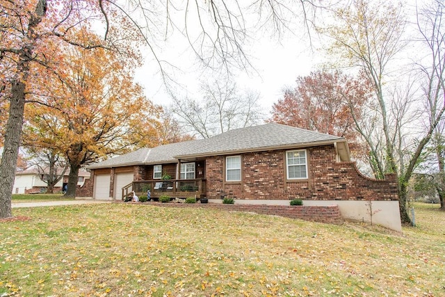 ranch-style house with a front lawn and a garage