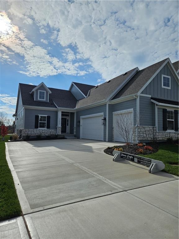 craftsman house with a garage