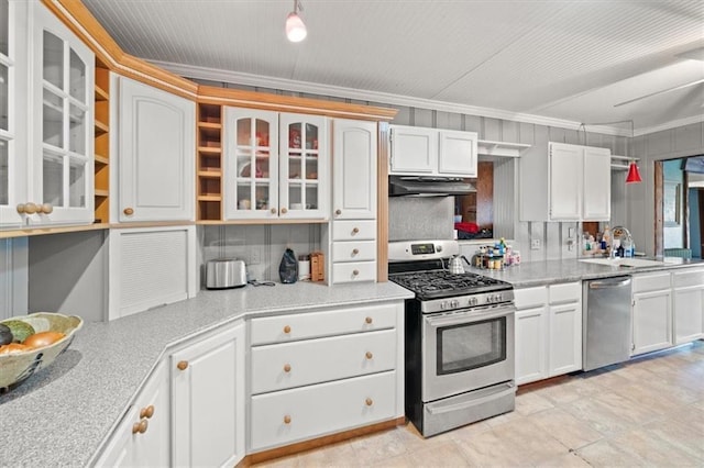 kitchen featuring white cabinetry, ornamental molding, and appliances with stainless steel finishes