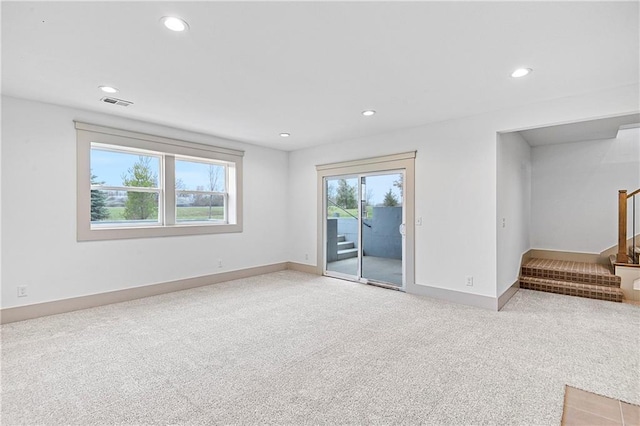 13465 W 174th Pl, Overland Park, KS 66221 - spare room featuring stairs, light carpet, and recessed lighting