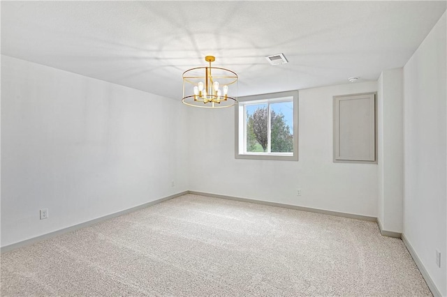 13465 W 174th Pl, Overland Park, KS 66221 - unfurnished room with light carpet and a chandelier