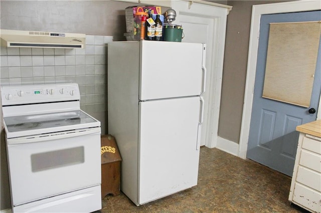 kitchen featuring white cabinetry, white appliances, tile walls, and range hood