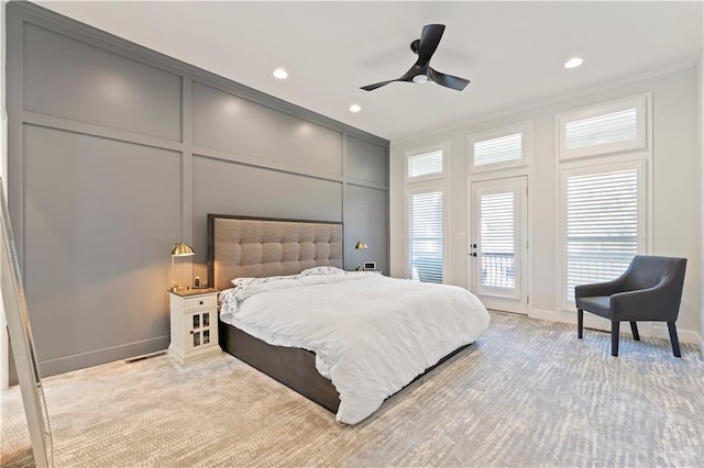 bedroom with access to exterior, ceiling fan, crown molding, and light colored carpet