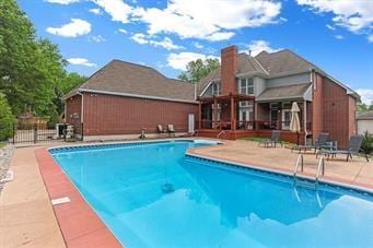 view of pool with a patio